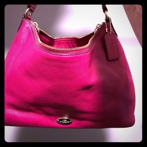 Leather Coach Handbag and clutch .